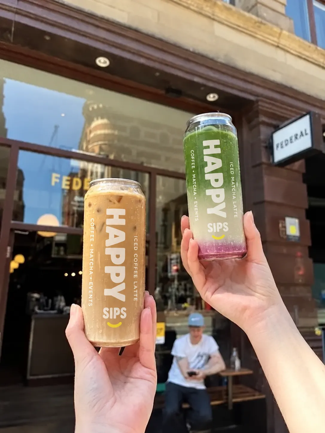 Happy Sips branded iced matcha can with custom campaign artwork